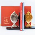 Decorative metal fish bookends