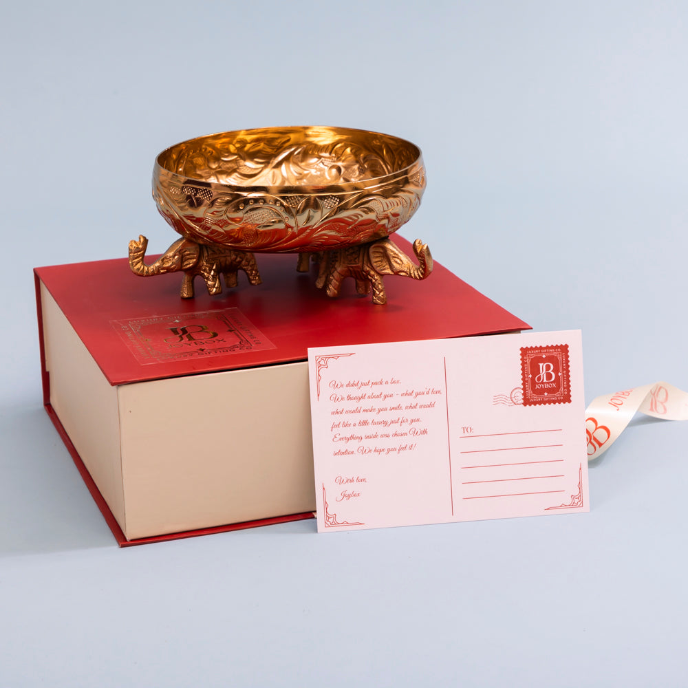 Ornate elephant-base decorative bowl